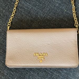Prada women’s gold chain leather wallet